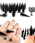 40 Pair Kickass Black Cone Spikes Punk Rivets Hardware Kit With Matching Screws And Heavy Duty Metal Bullet Studs displayed on hand.