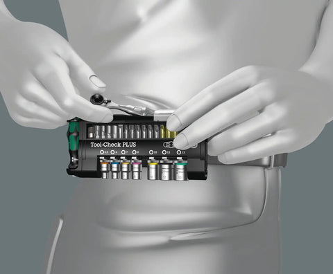 Person holding Tool Check Plus 39 Piece Mini Ratchet And Socket Set With Zyklop Mini Kraftform Grip for tight access.