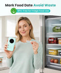 Image of a woman holding the No Sweat Bluetooth Mini Label Maker With Compact Thermal Printer for organizing food dates.