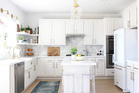 Modern kitchen with white cabinetry featuring Bar Appliance Pull From Urban Modern Collection, 12 Inch Center To Center Bar Handle.