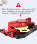 HB-100 Cable-Actuated Hydraulic Disc Brake Caliper Set for MTB, Road and E-Bike Front and Rear Pair With Built-In Brake Oil Upgraded Line-Pull Clamp Red Finish for Fast, Smooth Stopping. Red hydraulic disc brake caliper with yellow piston block inserted.