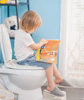 Child using round toilet seat with slow close and quick release easy clean plastic in white standard round size for family bathrooms.