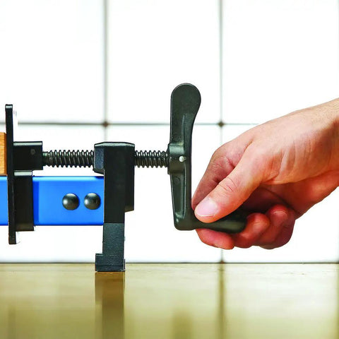 Close-up of hand adjusting 36 Inch Aluminum Bar Clamps For Woodworking With Built In Locking Hooks, showing pro-grade grip.