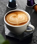 Top Shelf Fully Automatic Bean To Cup Coffee Maker With Integrated Grinder And 15 Bar High Pressure Extraction For Home And Office Slick One Touch Brewing Setup For Daily Grind Sessions in a cup with latte art.