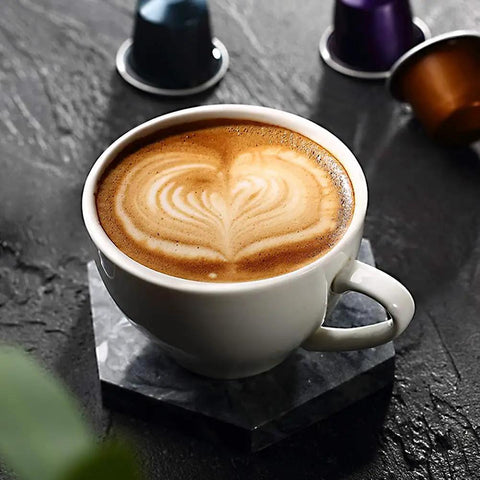 Top Shelf Fully Automatic Bean To Cup Coffee Maker With Integrated Grinder And 15 Bar High Pressure Extraction For Home And Office Slick One Touch Brewing Setup For Daily Grind Sessions in a cup with latte art.