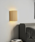 Indoor Hardwired Up and Down Cream Wall Sconce Set of 2 Modern LED 3000K on wall above bed in cozy bedroom.