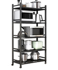 Five-Tier Metal Microwave Storage Rack On Wheels With Side Guardrails filled with kitchen appliances and cookware