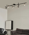 6 Light Foldable LED Integrated Track Lighting Slick Matte Black With Center Swivel Heads installed in living room ceiling