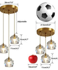 Size comparison of Three Light Crystal Cluster Pendant Chandelier In Gold Finish next to soccer ball and apple, showcasing dimensions.