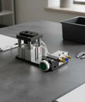 Edge Banding Punch With Double Hole Pneumatic System Aluminum Alloy Housing CNC Finished Compact Cabinet Maker Tool For Furniture Assembly 8/15mm Double Hole Puncher Fast Setup Precise Alignment Smooth Clean Finishes, black aluminum alloy pneumatic punch on workbench