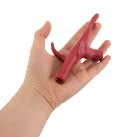 Close-up of red fencing replacement grip and stable handle for foil in hand.