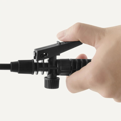 Close-up of ergonomic thumb trigger on 1.3 Gallon Garden Sprayer With Extension Wand For Yard Work, Flower Beds, And Plants.