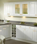 White kitchen cabinets with Four Leaf Clover Cabinet Knob Set 15 Pcs Zinc Alloy Pulls Gold Finish Clover Handles installed.