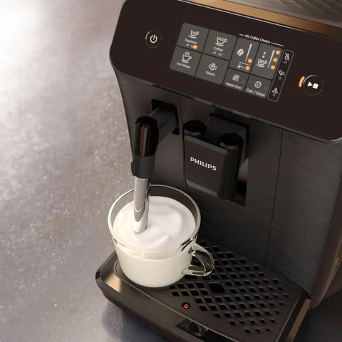 Top Shelf Automatic Espresso Brewer With Sturdy Built In Bean Mill And Silky Milk Frother For Killer Morning Brews No Hassle Auto Clean Features Plus Bold Flavor Dials For Real Coffee Heads Everyday with milk frother in use.