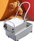 Kickass Commercial Fryer Filter With 550 Watt Pump And 55 Liter Tank, stainless steel unit filtering grease above fried chicken.