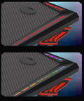 Close-up view of Dope Rose Pink Gaming Desk With Rgb Ambient Glow, showing carbon fiber surface and RGB lighting effects.