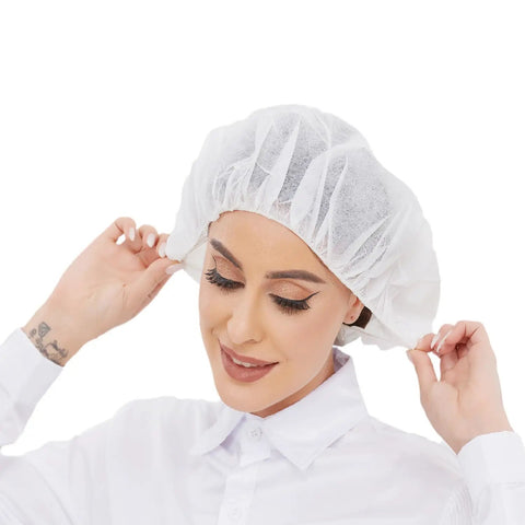 Model wearing Disposable Bouffant Hair Net for Food Service and Beauty, Latex Free, 24 Inch Cap, Pack of 100, White