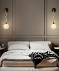 Top Shelf High Quality Brushed Brass Wall Sconce Paired With Frosted Glass Globe Led Bathroom And Bedroom Vanity Light Adjust Your Space With This Durable Fixture Dropping Real Modern Style above a cozy bed in a stylish bedroom.