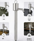 Hand Operated Manual Fluid Transfer Pump Stainless Steel Portable Siphon For Gas, Oil And Water Home Brewing Garage Work Reliable Gear positioned above various containers.