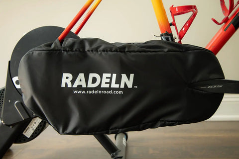 Indoor Bike Trainer Chain Cover And Drivetrain Guard padded black cover on a bike chainstay, fits most drivetrains