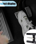 Car brake booster push rod adjustment tool with magnet; black metal gauge shown in circular inset near brake pedals
