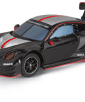 Close-up of Porsche 911 GT3 R slot car from Hybrid Highway Challenge Racing Set Dope Next Gen Vibe With Porsche 911 GT3 R In One To Fifty Scale Hybrid Technology With AI Support And Easy Smartphone App Control For Realistic High Performance Slot Car Fun, showing sleek black design with red accents.
