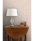 Abstract Animal Design Pvc Free Type Ii Commercial Wallpaper Featuring Matte Linen Texture Easy Paste To Paper Install in beige with a decorative lamp.