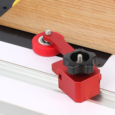 Dang Tough Bearing Roller Featherboards Precision Stock Guides Feed Steady On Table Saw Router And Band Saw Top Shelf Aluminum Woodworking Safety Accessory In Bold Red, close-up of roller and adjustment knob.