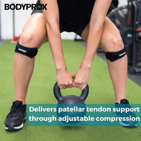 Person using Patella Tendon Knee Strap 2 Pack, Adjustable Knee Support Brace for pain relief during weightlifting workout.