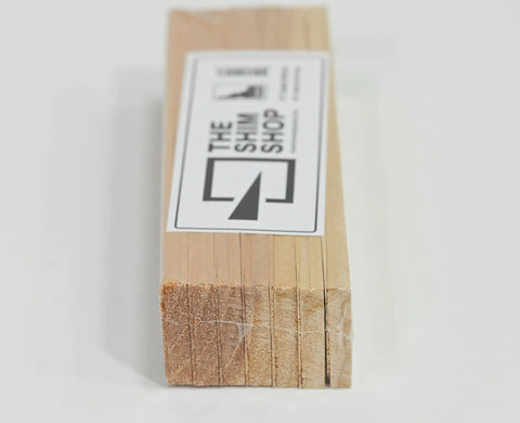 Hella Durable Kiln Dried Cedar Shims Bulk Case 420 Count Rot Resistant 8 Inch Fine Tip Wedges stacked in packets.