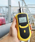 Handheld Carbon Monoxide Detector 0 to 1000 ppm CO Gas Tester with LCD display, shown in use at an industrial site