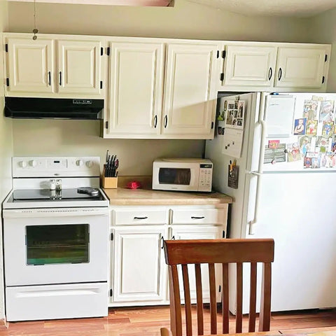 White kitchen cabinets with 25 Pair Set of Self-Closing Half Inch Overlay Cabinet Hinges in Black, Semi Partial Wrap for Face Frame.