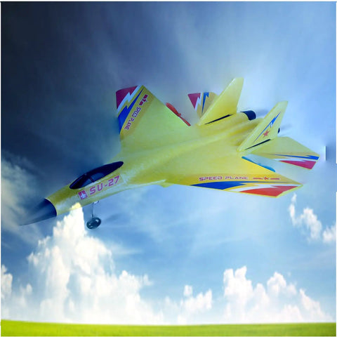 Dope Remote Control Fighter Plane With 2.4 GHz 6 Axis Gyro Anti Collision Foam Glider Aircraft soars in blue sky, yellow with colorful markings