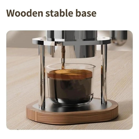 Pneumatic Air Pressure Coffee Machine With Manual Espresso Maker And Cold Brew Brewer Features Adjustable One To Sixteen Bar Hydraulic Gauge on wooden stable base.