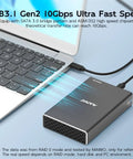 Dual Bay Hard Drive Raid Enclosure For 2.5 Inch SATA SSD And HDD Featuring USB 3.1 Gen 2 10Gbps connected to a laptop.