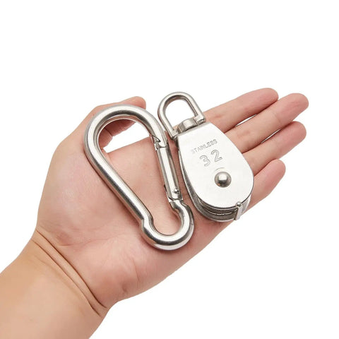 Two Pack M32 Stainless Steel Swivel Pulley Block With Carabiners in hand, showing size and detail, 250kg load capacity.