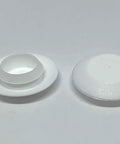 Front view of One Half Inch White Plastic Flush Hole Plugs With Snap In Head For Sheet Metal Holes in low-profile design on white surface.