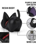 Resin black cat lamp with purple ear detail, showing wire cage, part of Kiki Jiji Cat Lamp Resin Night Light For Anime Fans.