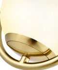Close-up of Integrated LED Pendant Light In Antique Brass With White Glass Shade, showing brass finish and white glass detail.