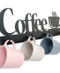 Coffee Mug Wall Rack With 12 Heavy Duty Hooks And Metal Sign for Coffee Bar Kitchen and Office Space Saving Wall Mounted Mug Organizer in use with pastel mugs