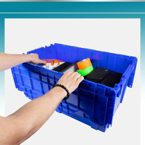 Person's hands reaching into a Rock Solid Heavy Duty 18 Gallon Plastic Tote With Handy Hinged Flip Lids Stackable Warehouse Storage Bins Pack Of Three