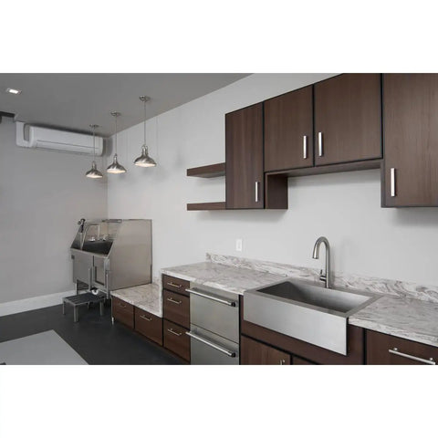 Modern kitchen with One Light Fresnel Glass Coastal Pendant in Brushed Nickel Finish for Indoor Kitchens and Bars over counter