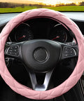 Sweet Baby Pink Steering Wheel Cover Soft Microfiber Leather 15 Inch Quilted design on a steering wheel in a car interior.