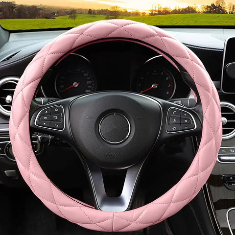 Sweet Baby Pink Steering Wheel Cover Soft Microfiber Leather 15 Inch Quilted design on a steering wheel in a car interior.