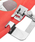 Universal Sewing Machine Presser Feet Set For Home Electric Models With Zipper Foot Binder Attachment And Overlock Presser detail of stainless steel binder foot on fabric.