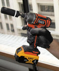 Impact Socket Set For One Half Inch Drive Metric 12 Point Deep Sockets Self Adjusting On power drill in gloved hand