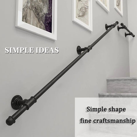 Built Like A Tank Wall Mount Handrail Stair Railing Bracket Complete Black Wrought Iron Kit Outdoor Indoor Step Support 19 Foot Long mounted on wall.