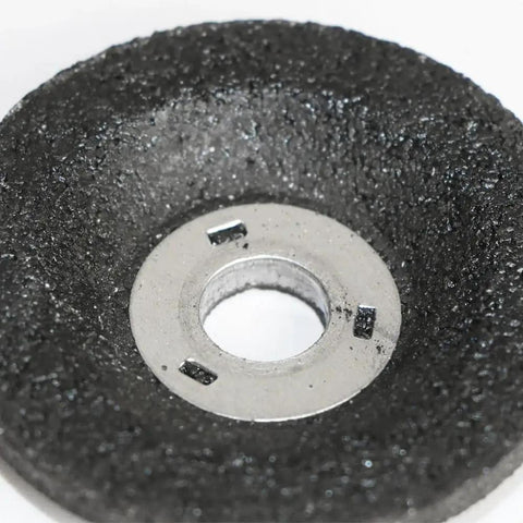 Close-up of a 2 Inch Grinding Wheels 25 Pack Polishing Discs For Mini Angle Grinder with metal center and textured surface.
