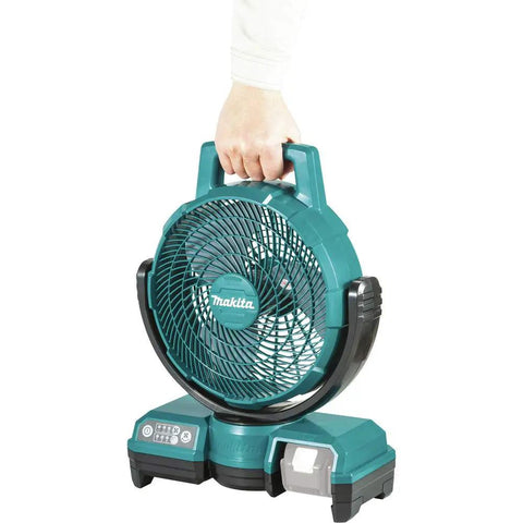 Person holding a teal 18V LXT Cordless Oscillating Fan 9-1/4 Inch Quiet Desk and Jobsite Fan with three-speed settings and tilt options.