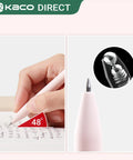 Two Pack Gel Pens With Cute Heart Design In Pink Ink Includes Four Extra Black Refills A Go-To Stationery Set For Journaling Note Taking And Doodling Super Smooth Writing Great Gift For Students And Creative Minds Who Love Pretty Pens, image showing a pink gel pen held at 48-degree angle writing on paper with pen tip close-up.